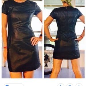 C.lective black leather dress